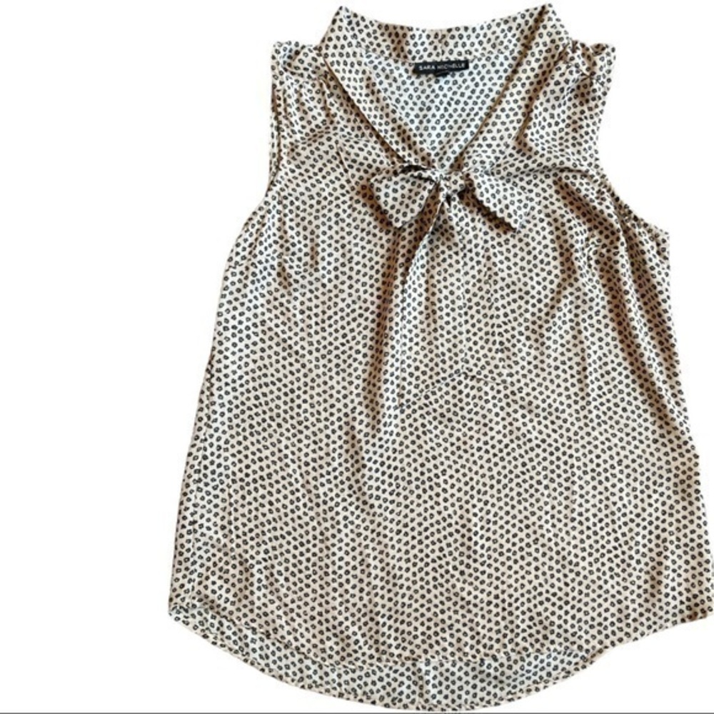SARA MICHELLE size medium sleeveless blouse, sheer material, ties in front